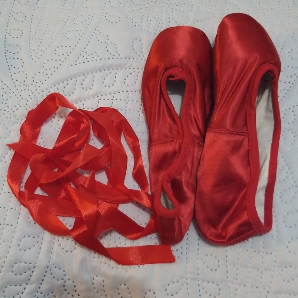 Red satin ballet pointe shoes